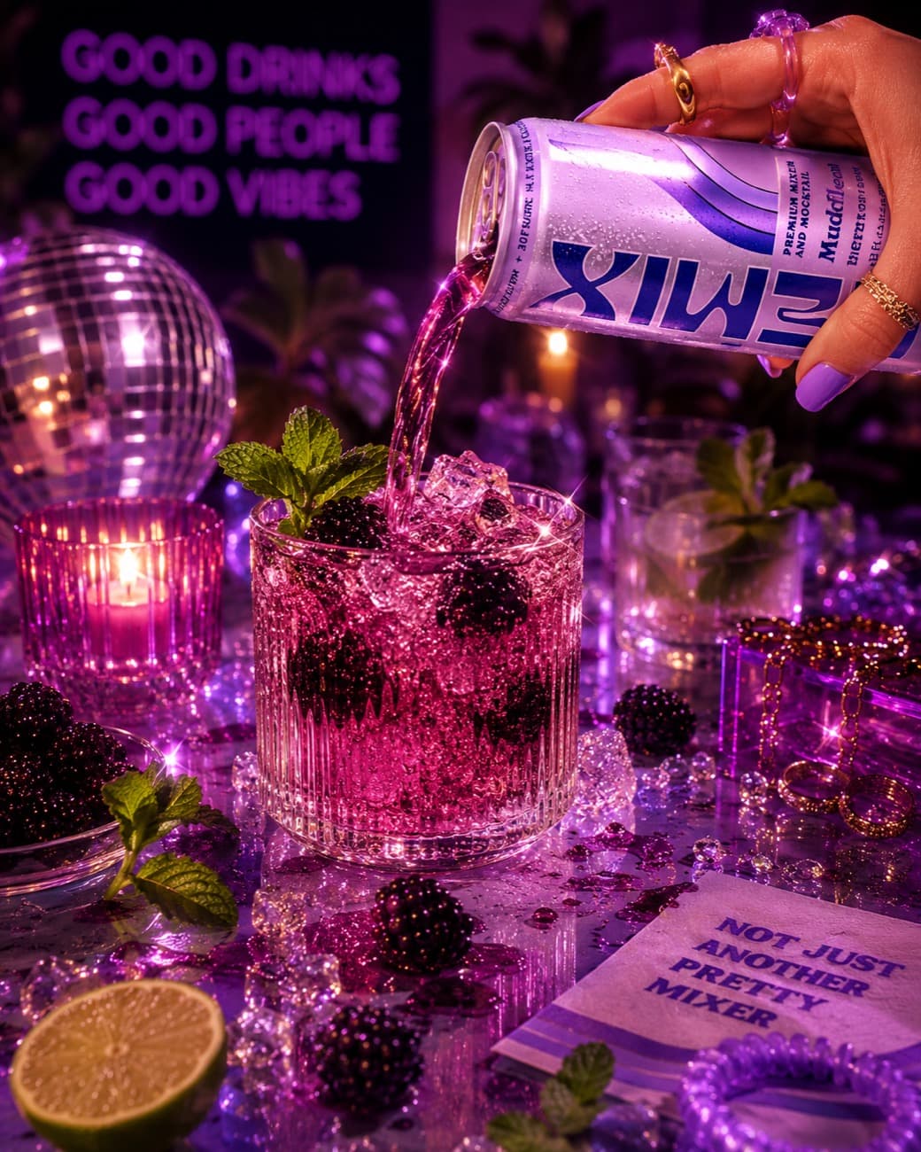 Remix Muddled Berry Mojito poured over ice with blackberries and mint